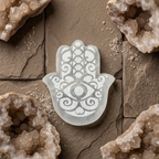 Selenite Disc – Hamsa Shape With Carving
